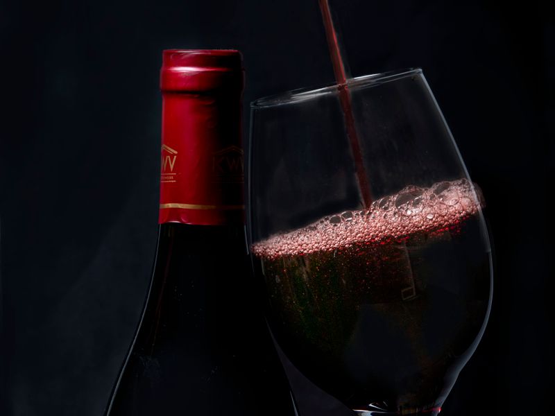Red wine being poured into a glass